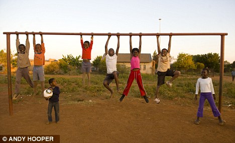 Children Playing Football In Africa