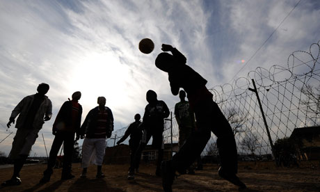 Children Playing Football In The Street