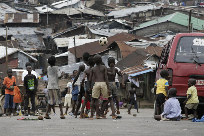 Children Playing Football In The Street