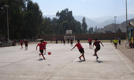 Children Playing Football In The Street