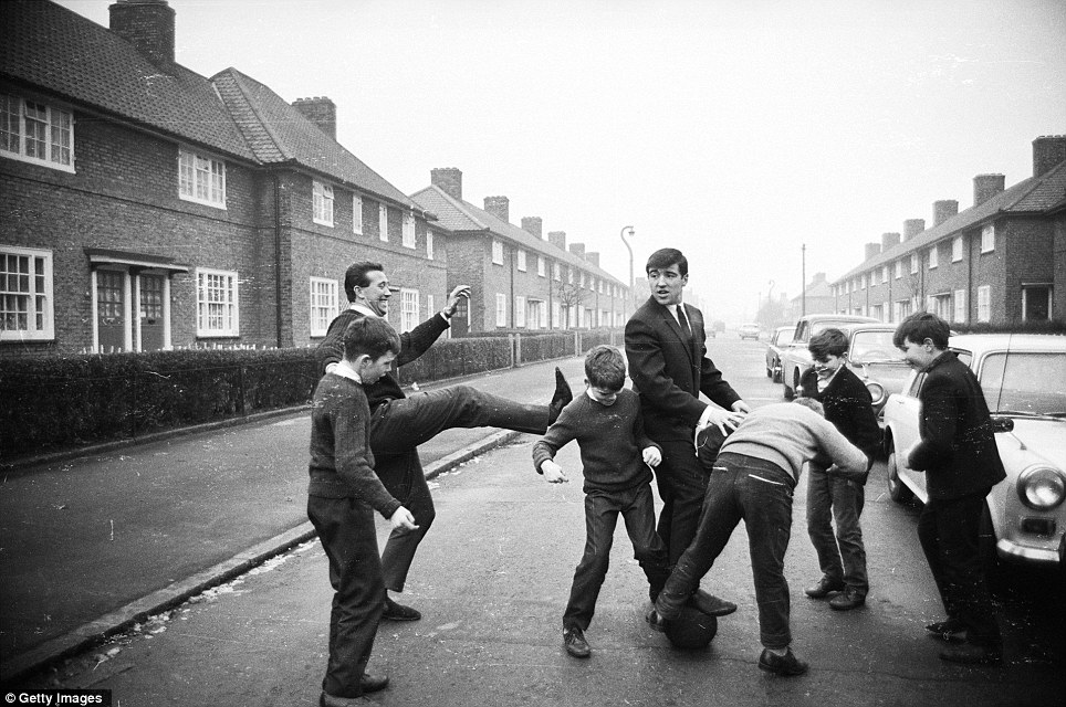 Children Playing Football In The Street