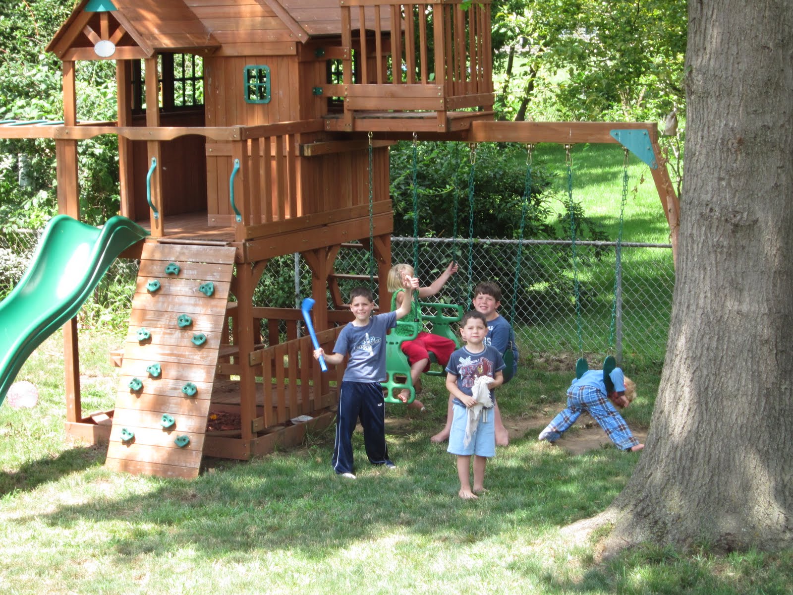 Children Playing Outside In A Nursery