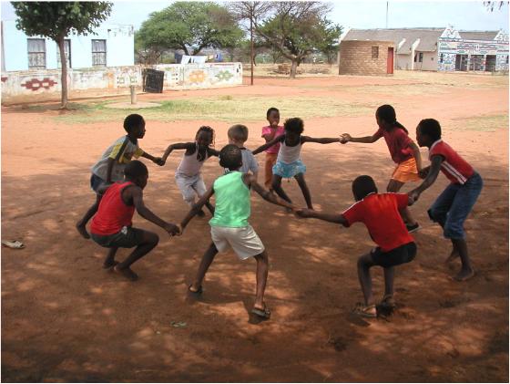 Children Playing Outside In The Park