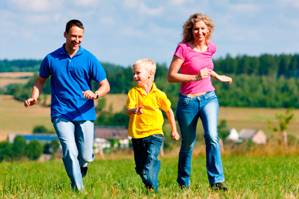 Parents And Children Playing Together